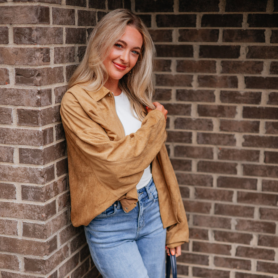 Wild Oak Boutique creator wearing a leopard jacket
