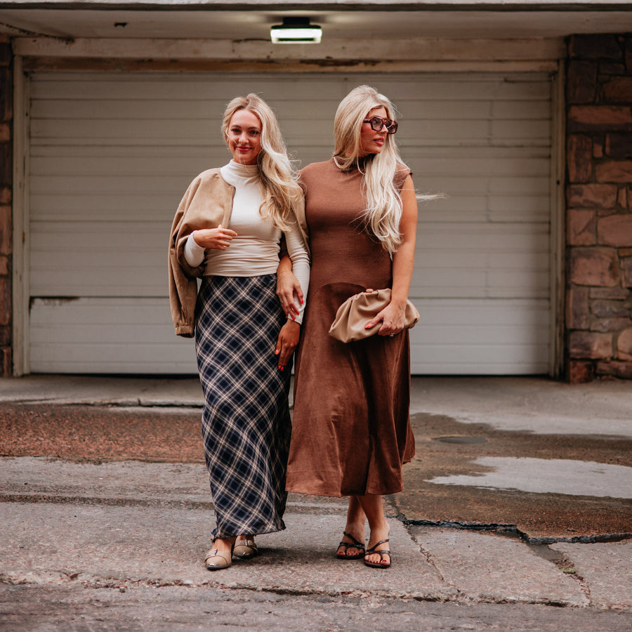 Wild Oak Boutique creator wearing a neutral bodysuit