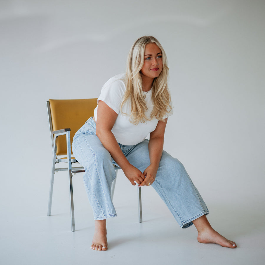 Wild Oak Boutique creator wearing a neutral bodysuit